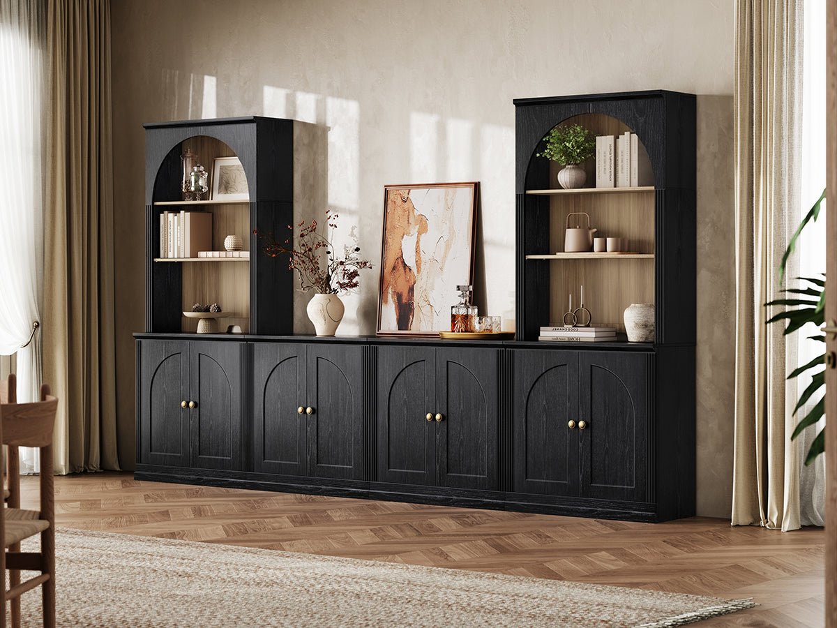 MONOS black modular wall storage cabinet set with arch-top shelves and hinged lower cabinets in a modern living room