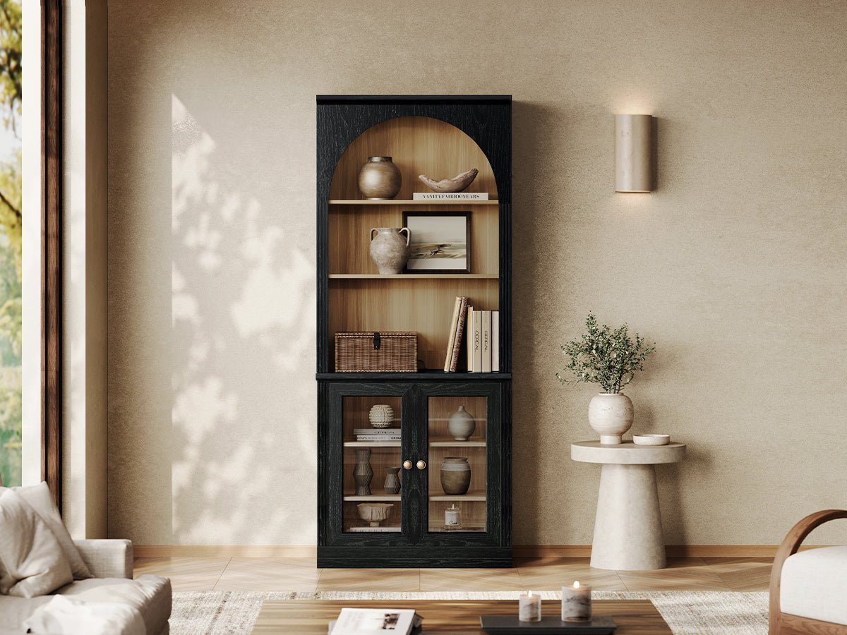 Monos black flat-top display cabinet with open shelves and glass doors in a living room