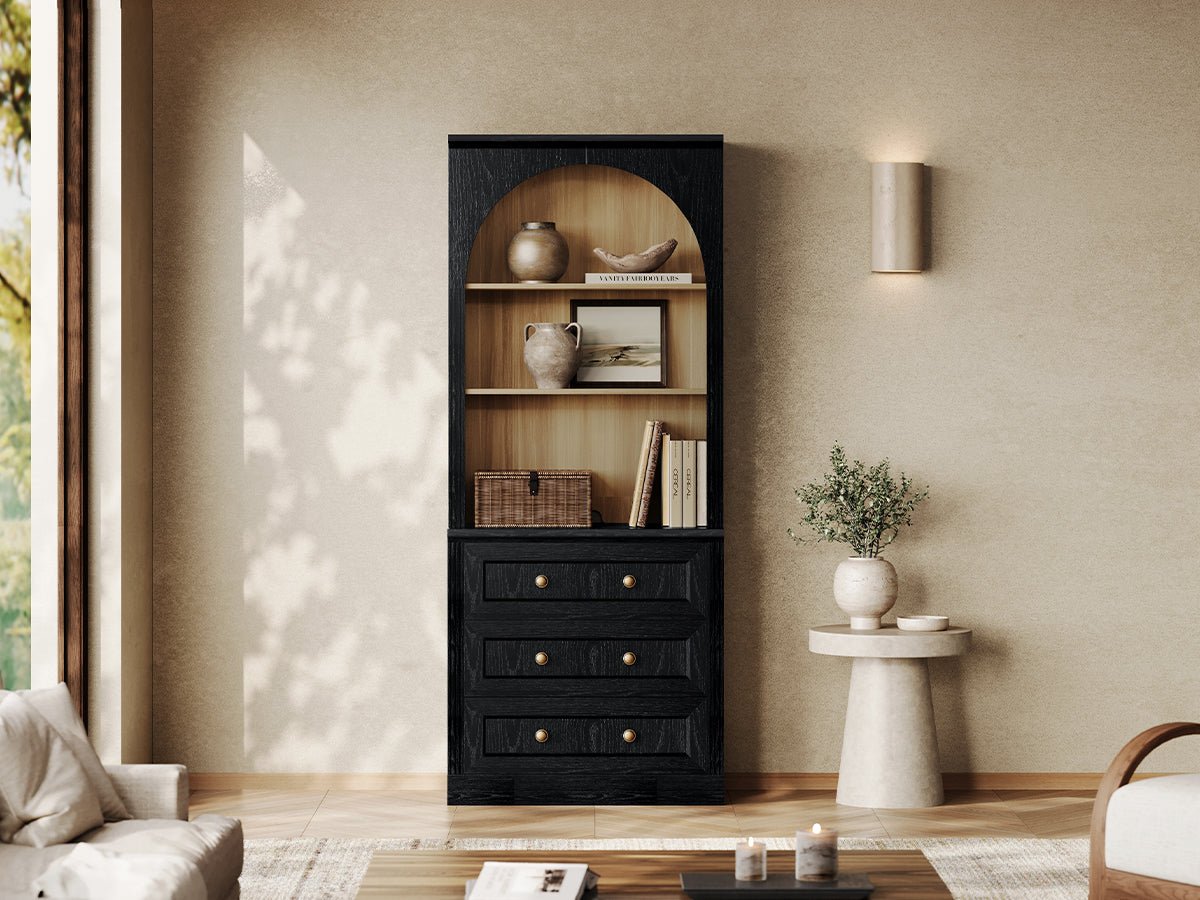 Monos black flat-top drawer cabinet with open shelves and lower drawers in a living room
