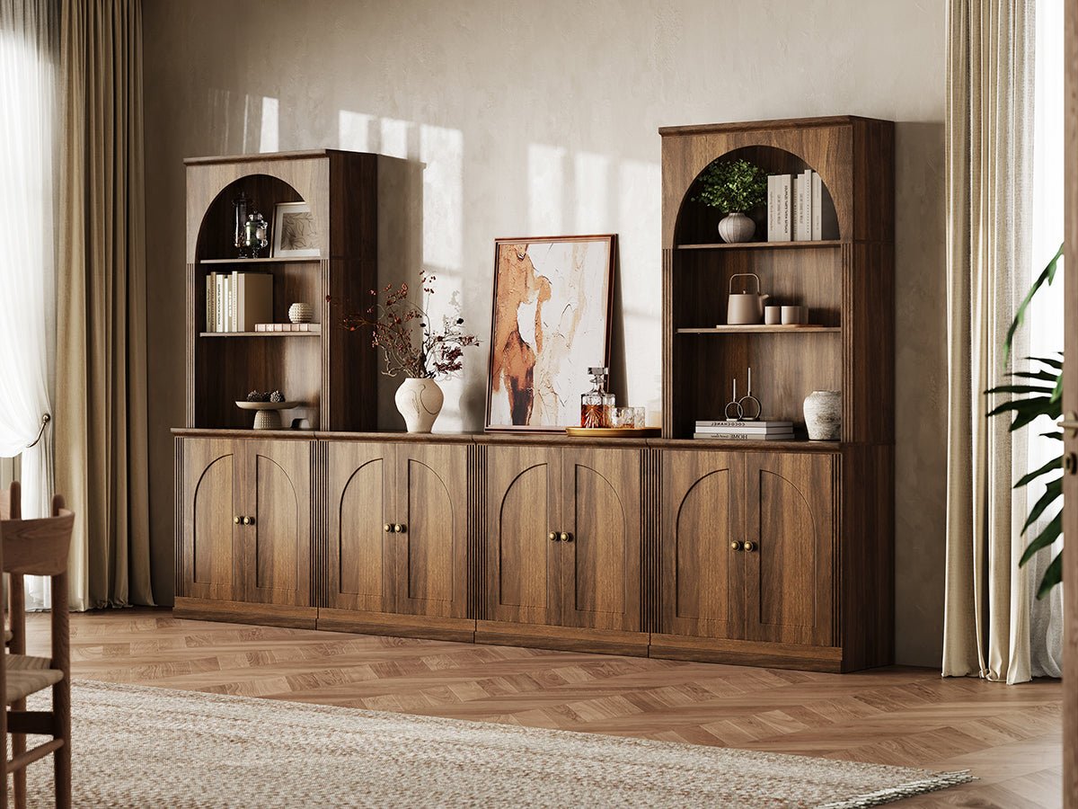 MONOS walnut modular wall storage cabinet set with arch-top shelves and hinged lower cabinets in a warm living room