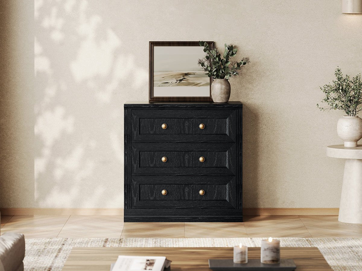 Monos black modular drawer cabinet displayed in a modern living room setting