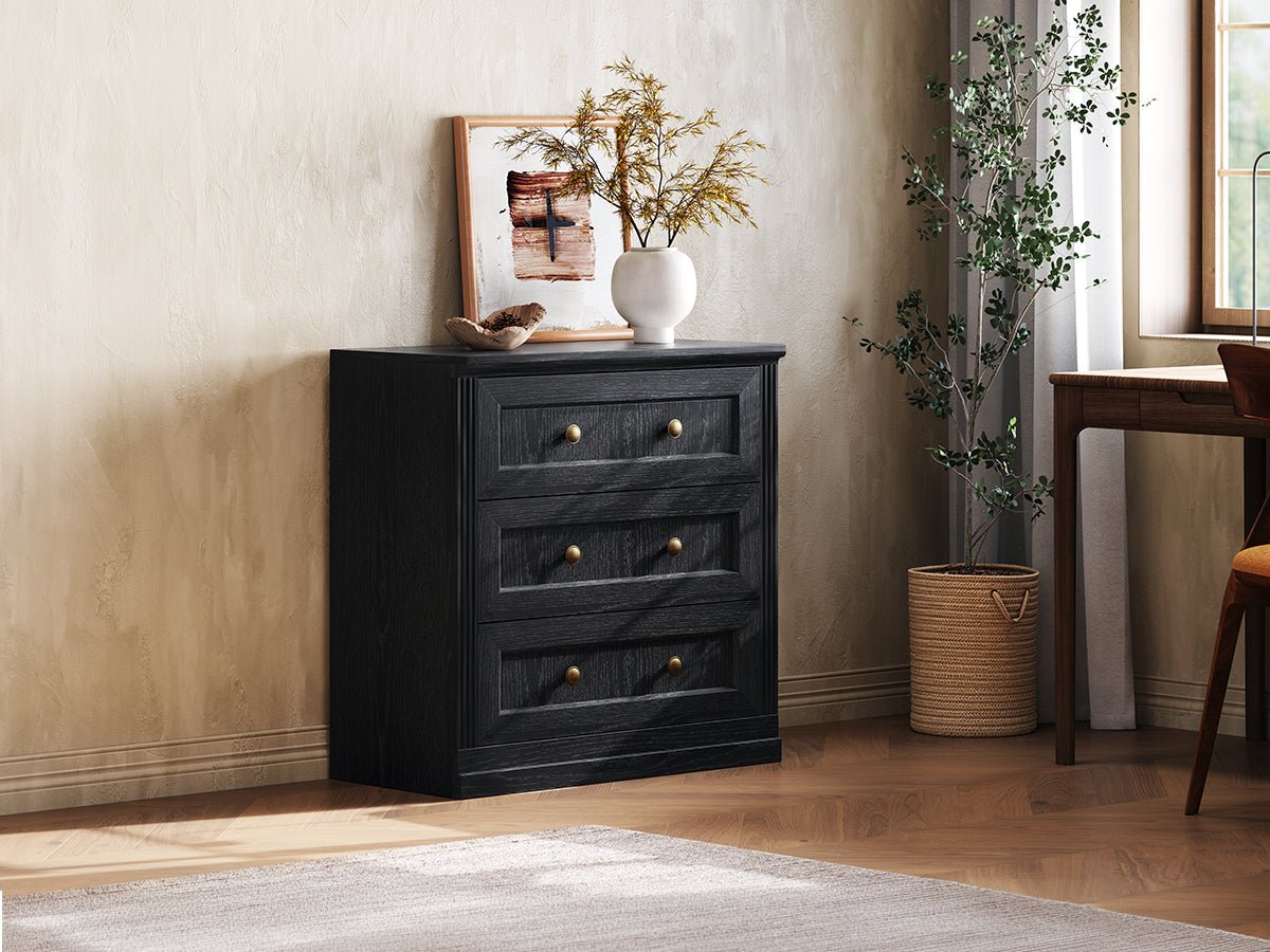 Monos black drawer storage cabinet displayed beside a window in a warm room scene