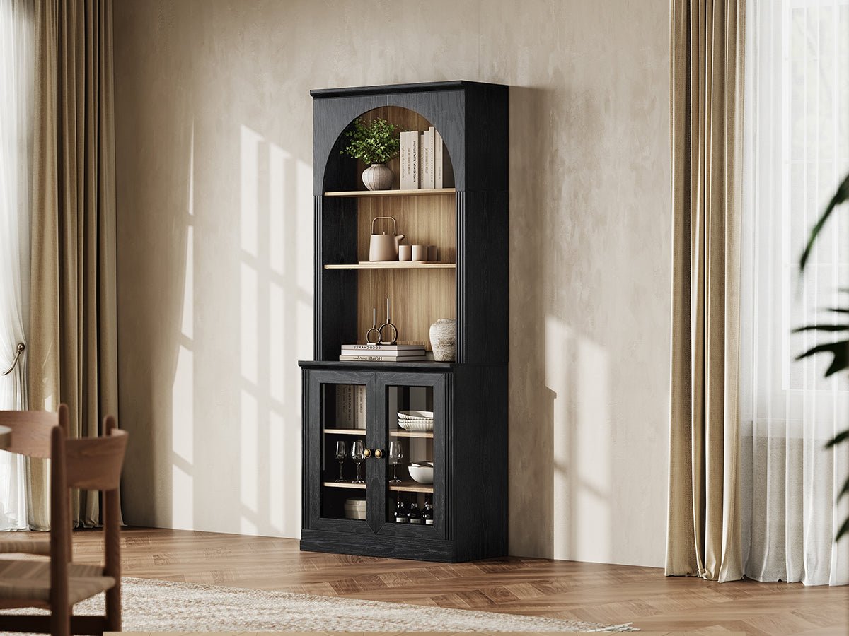 Monos black tall flat-top display cabinet styled in a bright lifestyle room scene