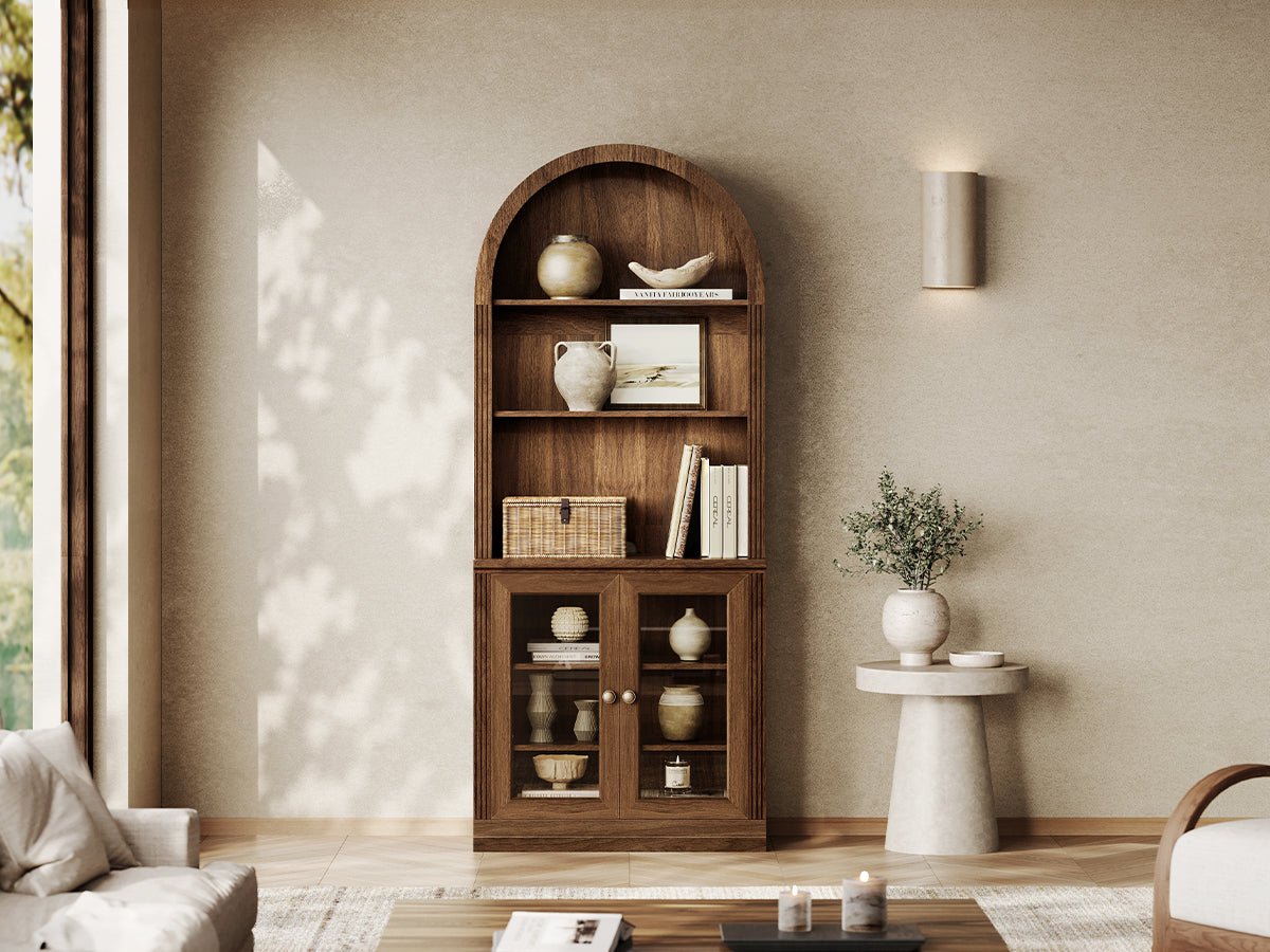Monos walnut arch-top display cabinet with open shelves and glass doors in a living room