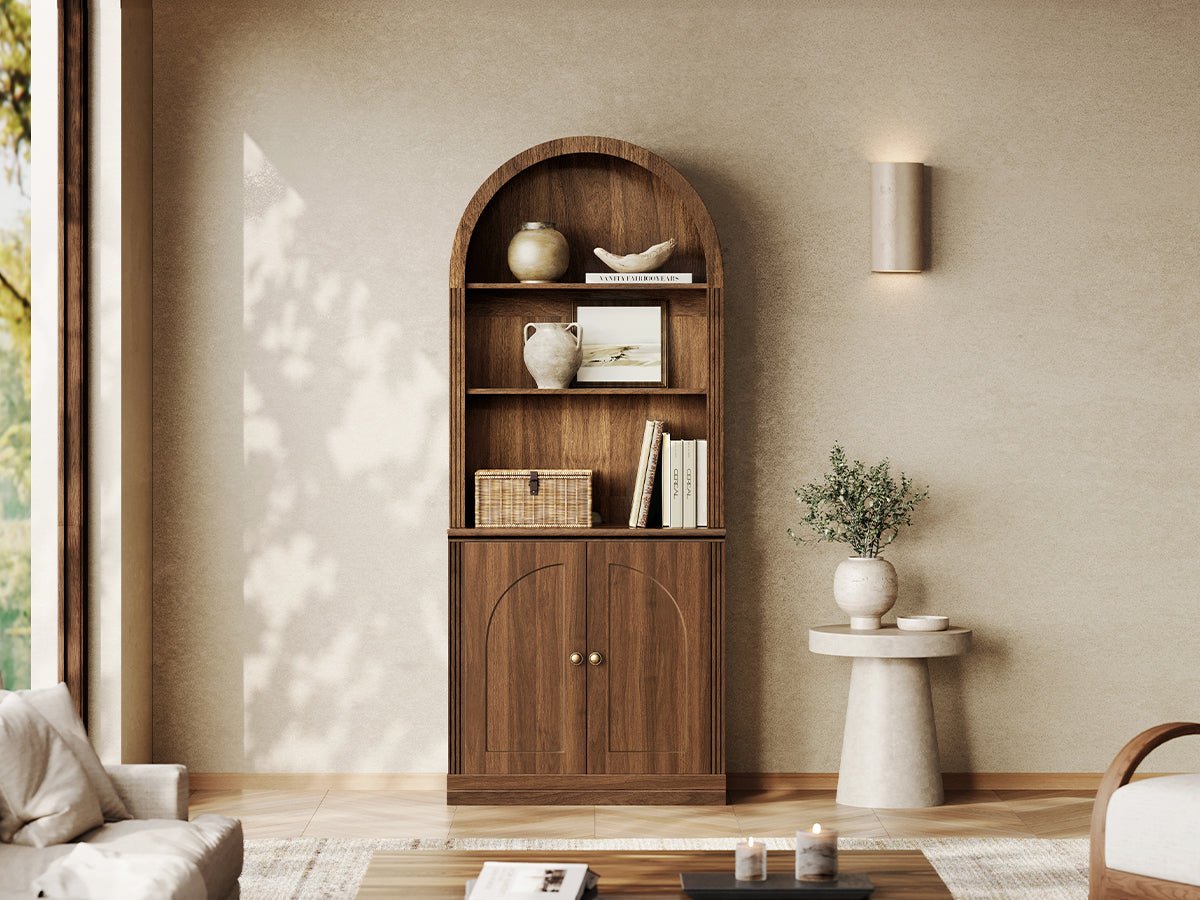 Monos walnut arch-top storage cabinet with open shelves and lower doors in a living room