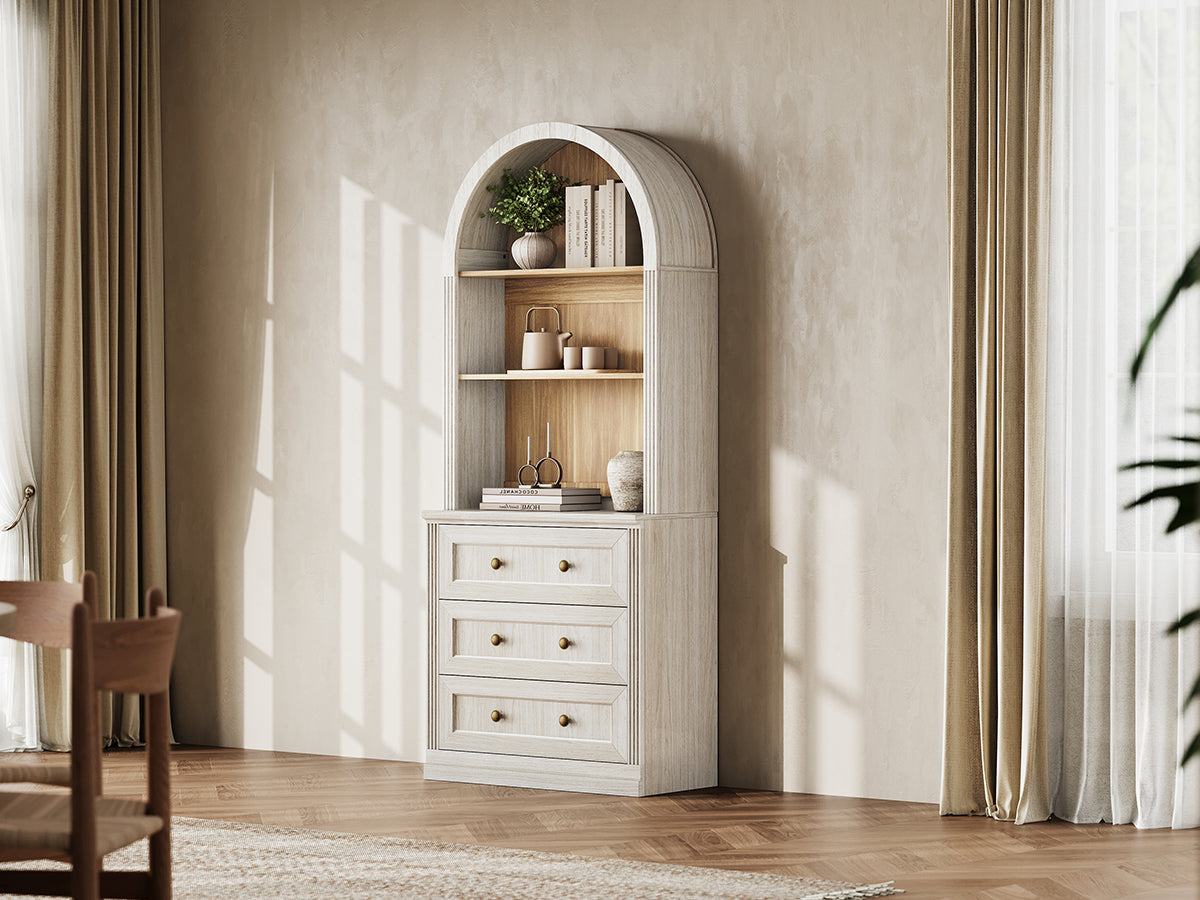 Monos white tall arch-top drawer cabinet styled in a bright lifestyle room scene