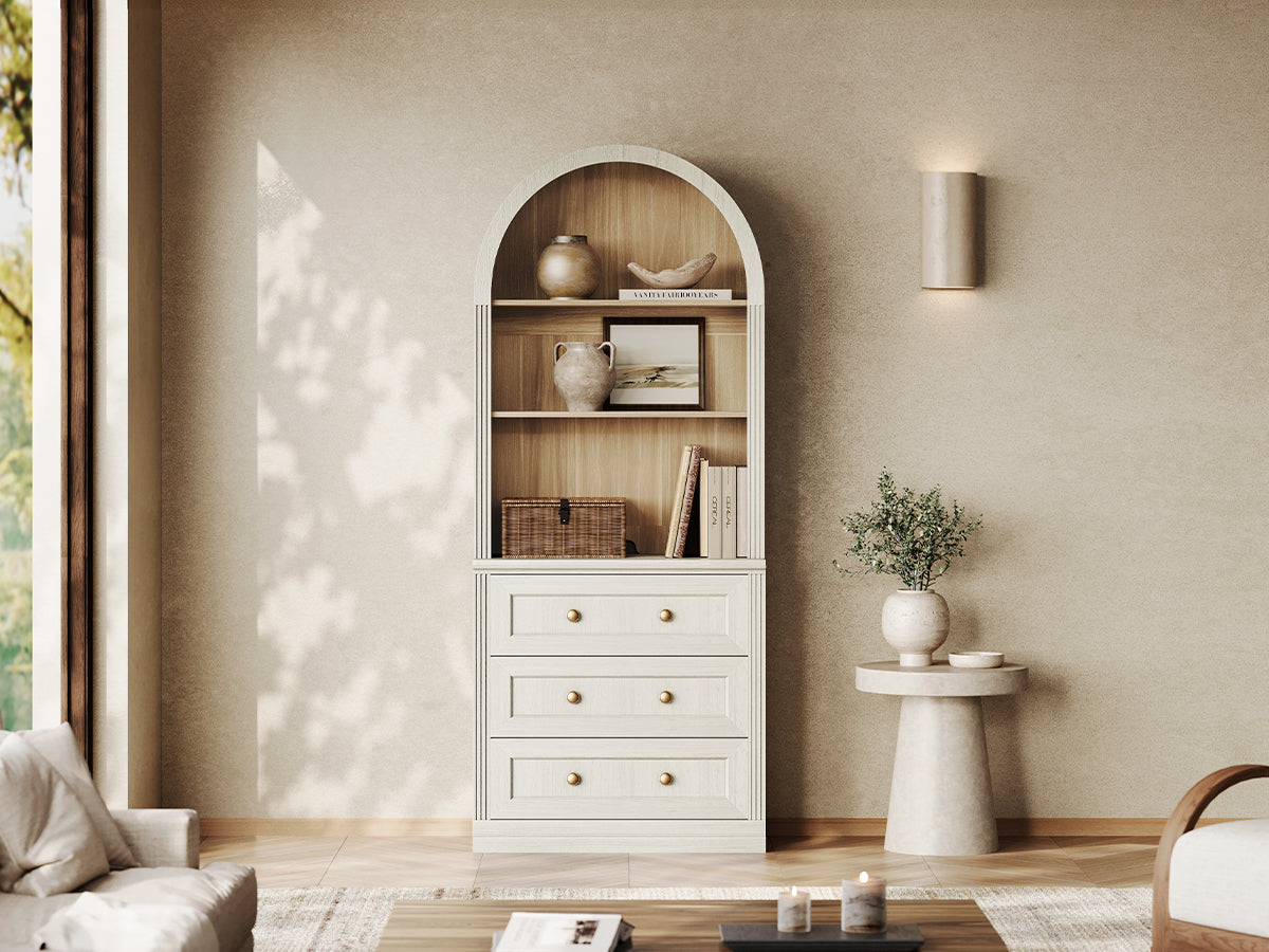 Monos white arch-top drawer cabinet with open shelves and lower drawers in a living room