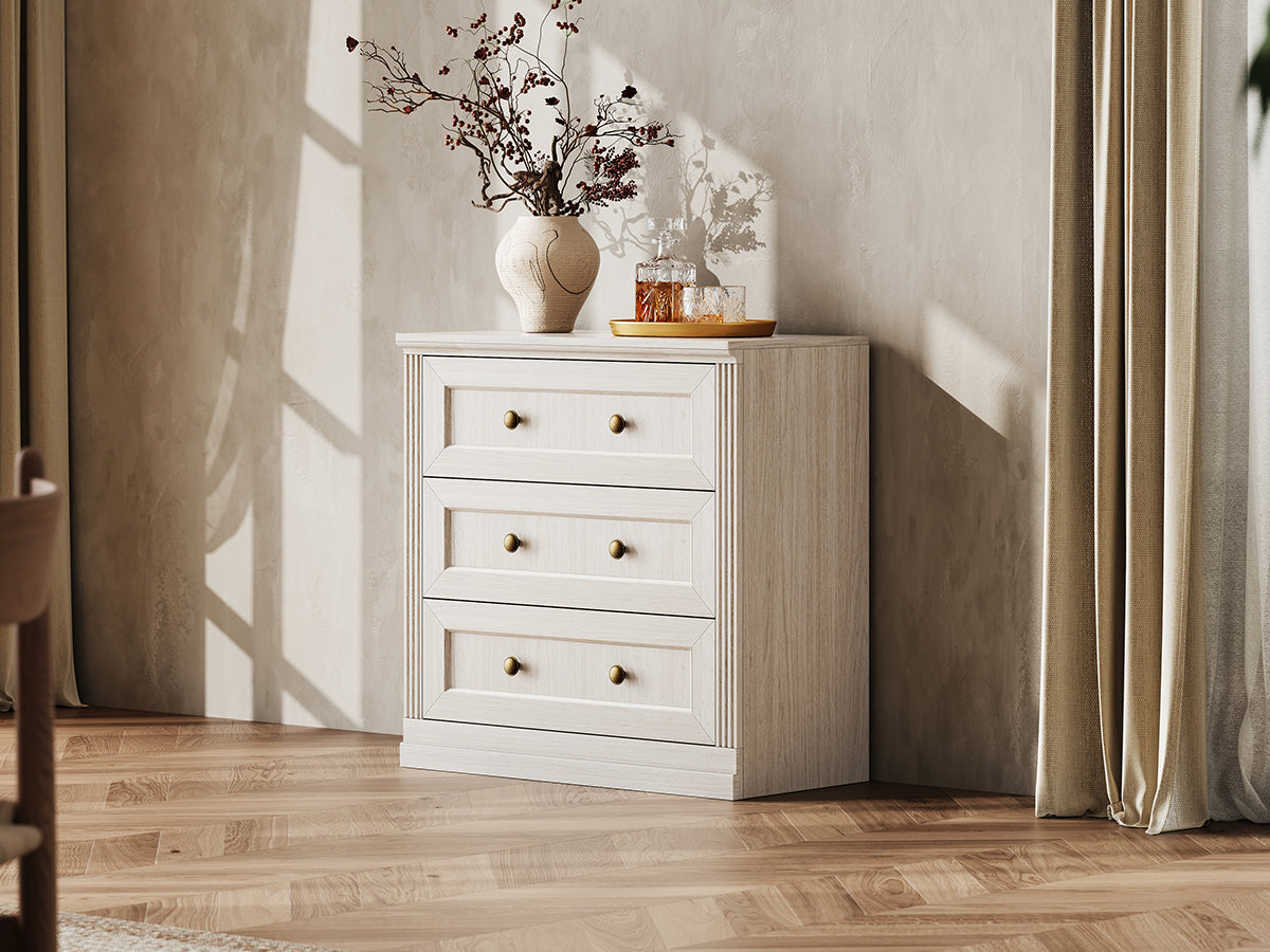 Monos white drawer storage cabinet styled in a lifestyle room scene with decor