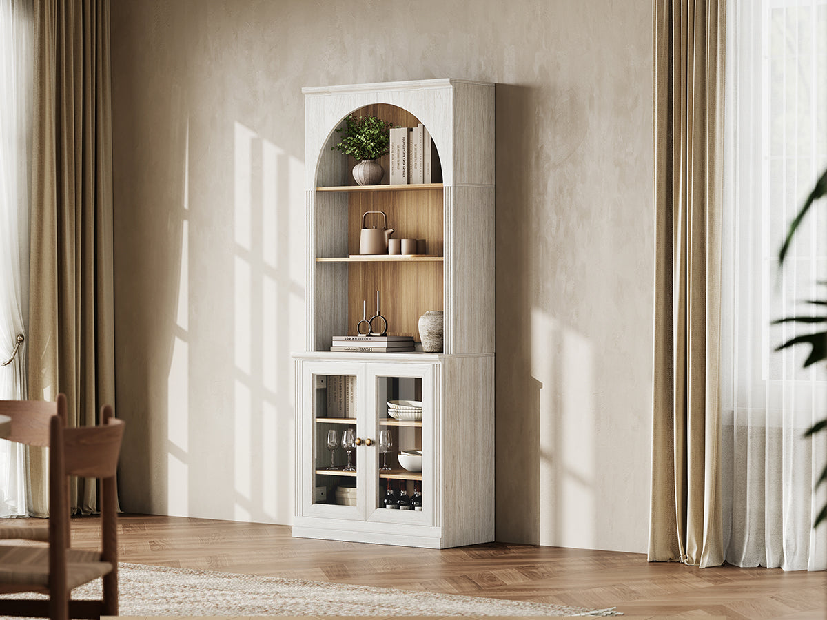 Monos white tall flat-top display cabinet styled in a bright lifestyle room scene